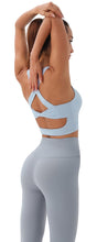 Load image into Gallery viewer, JOYSPELS Sports Bras for Women Extra Comfort Criss-Cross Back Padded Workout Tops for Women Medium Support Light Blue