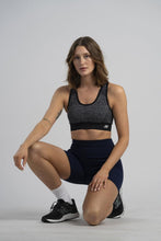 Load image into Gallery viewer, New Balance Women's Seamless MID Impact Heather Keyhole Sport Bra with Removable Pads, Black