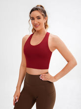 Load image into Gallery viewer, JOYSPELS Sports Bras for Women Extra Comfort Criss-Cross Back Padded Workout Tops for Women Medium Support