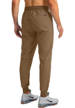 Load image into Gallery viewer, Pudolla Men's Lightweight Tapered Jogger Pants with Zip Pockets – Quick-Dry Athletic Running Joggers in Brown