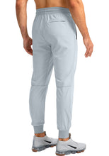 Load image into Gallery viewer, Pudolla Men's Lightweight Tapered Jogger Pants with Zip Pockets – Quick-Dry Athletic Running Joggers in Light Grey