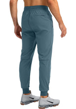 Load image into Gallery viewer, Pudolla Men's Lightweight Tapered Jogger Pants with Zip Pockets – Quick-Dry Athletic Running Joggers in Blue Purple