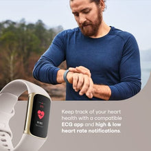 Load image into Gallery viewer, Fitbit Charge 5 Advanced Fitness & Health Tracker with Built-in GPS, Stress Management Tools, Sleep Tracking, 24/7 Heart Rate and More, Lunar White/Soft Gold, One Size (S &L Bands Included)