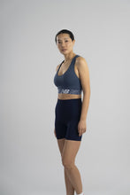 Load image into Gallery viewer, New Balance Womens Seamless Wirefree, Racerback Sports Bra with Removable Pads, Bottom Band with Logo, Camo Magnet
